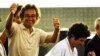 Freed by kindappers in Mali, Albert Vilalta (r) and Roque Pascual after arriving at the airport in Prat Llobregat, Spain, Aug. 24, 2010. (AP)