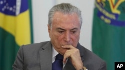 Brazil's President Michel Temer attends a ceremony at the Planalto presidential palace, in Brasilia, Brazil, April 12, 2017.