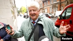 FILE - Stanley Johnson, father of Britain's Prime Minister Boris Johnson, is seen in Westminster, in London, Britain, Sept. 24, 2019. 