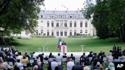 French President Emmanuel Macron delivers his speech during a meeting with members of the Citizens' Convention on Climate to discuss over environment proposals at the Elysee Palace in Paris, June 29, 2020. 