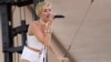 Miley Cyrus performs at IHeartRadio Music Village, Sept. 21, 2013 in Las Vegas.