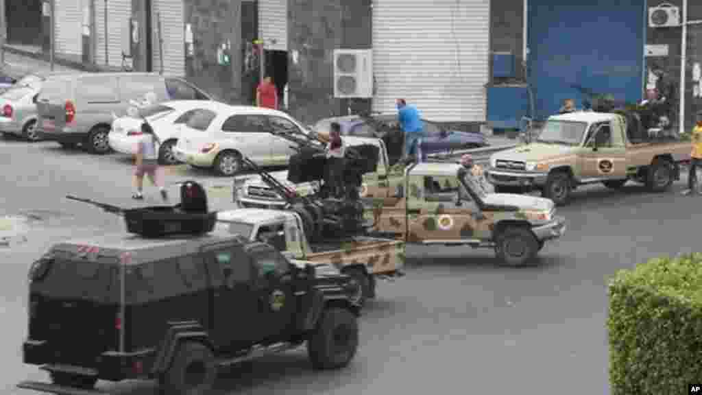Forces loyal to rogue Libyan Gen. Khalifa Haftar attacked Tripoli's parliament Sunday, May 18, 2014.