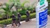 FILE - Kenya Defense Force soldiers run to take their positions at the Westgate shopping center, on the fourth day since militants stormed into the mall, in Nairobi, Sept. 24, 2013. 