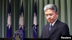 Taiwan's Deputy Foreign Minister Simon Shen-Yeaw Ko attends a news conference at the Ministry of Foreign Affairs in Taipei on Gambia's decision, Nov. 15, 2013.