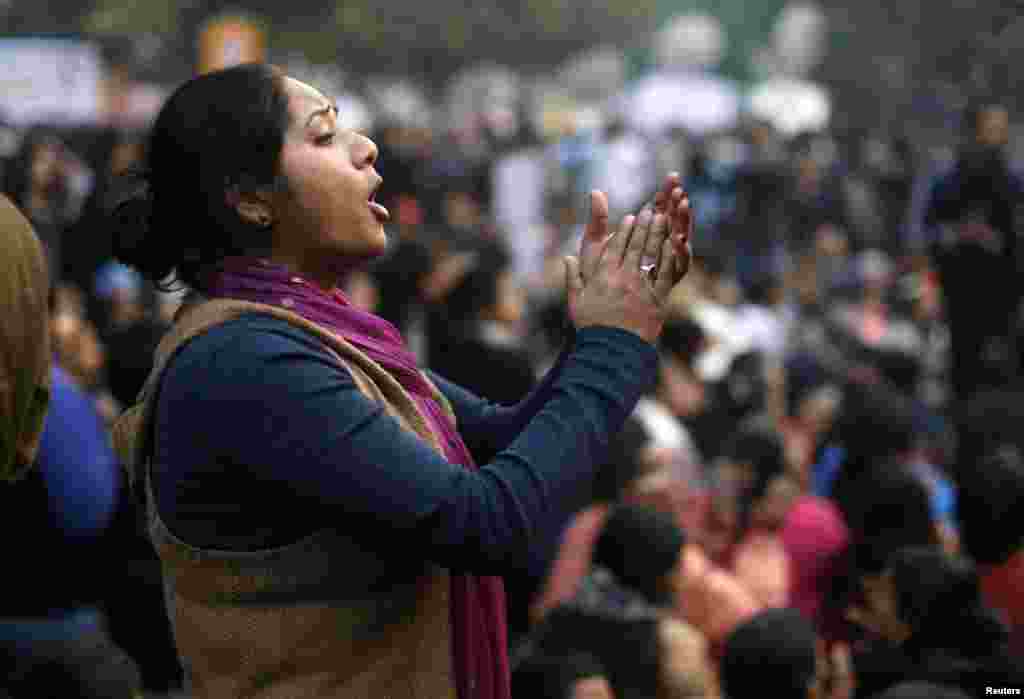 A demonstrator shouts slogans during a protest in New Delhi, December 29, 2012.