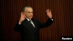 Brazil's President Michel Temer attends a meeting with the Pension Reform Commission at the Planalto Palace in Brasilia, Feb. 21, 2017. 