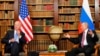 FILE - U.S. President Joe Biden, left, and Russia's President Vladimir Putin meet for the U.S.-Russia summit at Villa La Grange in Geneva, Switzerland, June 16, 2021.