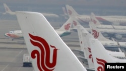 資料照片：北京國際機場停機坪上的中國國航飛機。(2016年3月28日)