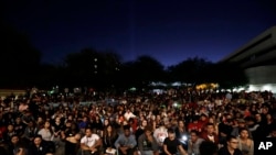 Students from University of Nevada Las Vegas hold a vigil Oct. 2, 2017, in Las Vegas. 