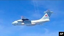 This handout photo from the Royal Malaysian Air Force taken on May 31, 2021 and released on June 1, 2021 shows a Chinese People's Liberation Army Air Force (PLAAF) Ilyushin Il-76 aircraft.