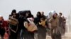 Dubban 'Yan Siriya Na Barin Ghouta