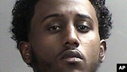 FILE - This undated file photo provided by the Sherburne County Sheriff's Office in Elk River, Minnesota, shows Hanad Musse, who was sentenced Nov. 15, 2016, to 10 years in prison for conspiring to join the Islamic State group in Syria.