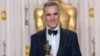 After winning the Oscar® for performance by an actor in a leading role for his role in “Lincoln”, actor Daniel Day-Lewis poses backstage for the press with his Oscar®. (Photo: Heather Ikei / AMPAS)