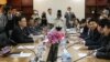 H.E. Ho Xuan Son, Deputy Minister of Foreign Affairs talks to his translator in a close door bilateral meeting with Var Kim Hong, chairman of the Cambodian Government Border Committee over border issues at Council of Ministers in Phnom Penh, Cambodia, July 7, 2015 .