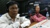 Mr. Chan Soveth, left, Department Chief of Investigation Unit of Adhoc and Mrs. Un Sophy, a representative of Lor Peang Community in Kampong Chhnang province. 