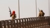Le Burkina Faso est confronté depuis 2015 à des violences jihadistes attribuées à des mouvements armés affiliés à Al-Qaïda et au groupe Etat islamique. (AP Photo/Sophie Garcia)