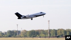 A German special medical plane takes off with Russian opposition leader Alexei Navalny onboard from an airport in Omsk, Russia, Aug. 22, 2020. 