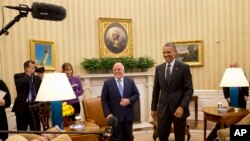 Iraqi Prime Minister Haider Al-Abadi and President Barack Obama after meeting in the Oval Office, Washington, April 14, 2015.