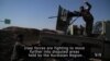 Iraqi and Kurdish Forces Battle for Remaining Disputed Territories