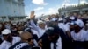 Democratic Republic of Congo opposition leader, former governor of Katanga Moise Katumbi waves as he arrives in Lubumbashi on May 20, 2019 after three years in self-imposed exile. - Thousands of people welcomed Moise Katumbi, a prominent foe of DR Congo's