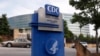 FILE - The Centers for Disease Control sign is seen at its main facility in Atlanta, Georgia, June 20, 2014.