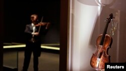 Violin that belonged to Titanic bandmaster Wallace Hartley on display at the Titanic Centre, Belfast, Sept. 18, 2013.