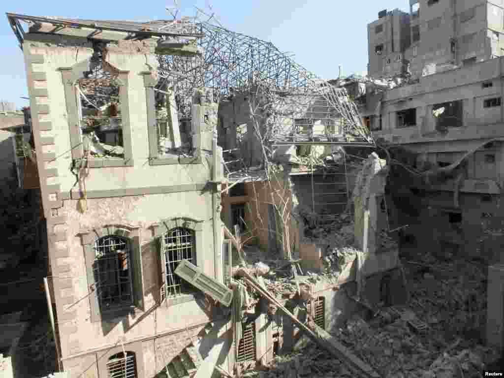 An Ottoman-era building damaged by an air strike in a besieged area in Homs, Syria, November 28, 2012.
