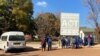 FILE - Zimbabwe authorities have maintained a heavy police presence to thwart any possible anti-government protests during the mandated COVID 19 lockdown, in Harare, July 22, 2020.