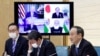 Japan's Prime Minister Yoshihide Suga speaks during the virtual summit of the leaders of Australia, India, Japan and the U.S., a group known as “the Quad", at his official residence in Tokyo, Japan, March 12, 2021.
