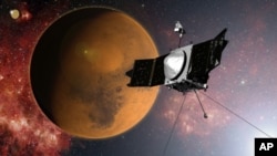 La sonde MAVEN approche la planète Mars. (AP Photo/NASA)