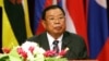 FILE - In this file picture taken on July 26, 2005, then Lao Prime Minister Bounnhang Vorachith addresses the opening ceremony of the 36th annual ministerial meeting of the Association of Southeast Asian Nations (ASEAN) in Vientiane. 