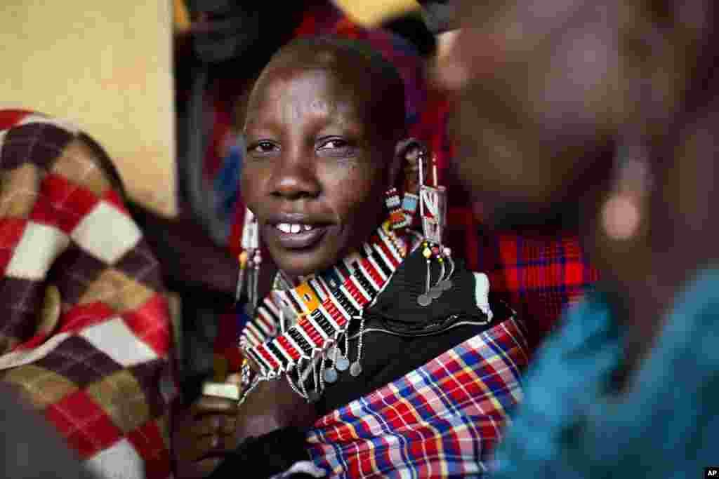 A Maasai lines up to vote in Bissil, 120 kilometers (75 miles) south of Nairobi, Kenya, Aug. 8, 2017.