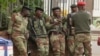 FILE: Soldiers are seen on the street in central Harare, Zimbabwe, Nov. 16, 2017. 