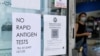 A pharmacy displays a sign to inform customers that Rapid Antigen Test kits are sold out in wake of COVID-19 in Sydney, Jan. 5, 2022.
