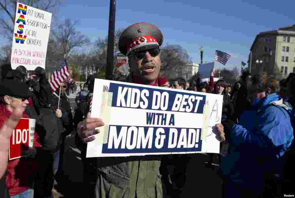 A supporter of traditional marriage rallies in front of the Supreme Court in Washington, March 27, 2013.