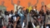 Opposition leaders gather during a protest at the Place de la Nation in Burkina Faso's capital Ouagadougou, calls for the departure of the military, Nov. 2, 2014.