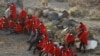FILE - A group of immigrants is pictured at Las Carpinteras beach on the island of Gran Canaria, Spain, May 26, 2020. 