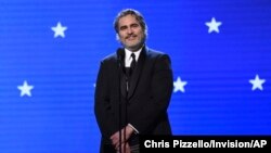 Joaquin Phoenix accepts the award for best actor for "Joker" at the 25th annual Critics' Choice Awards, Jan. 12, 2020, at the Barker Hangar in Santa Monica, California.