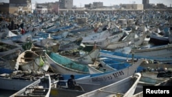 Fishing boats moored in the harbor at Nouadhibou, Mauritania, April 14, 2018.