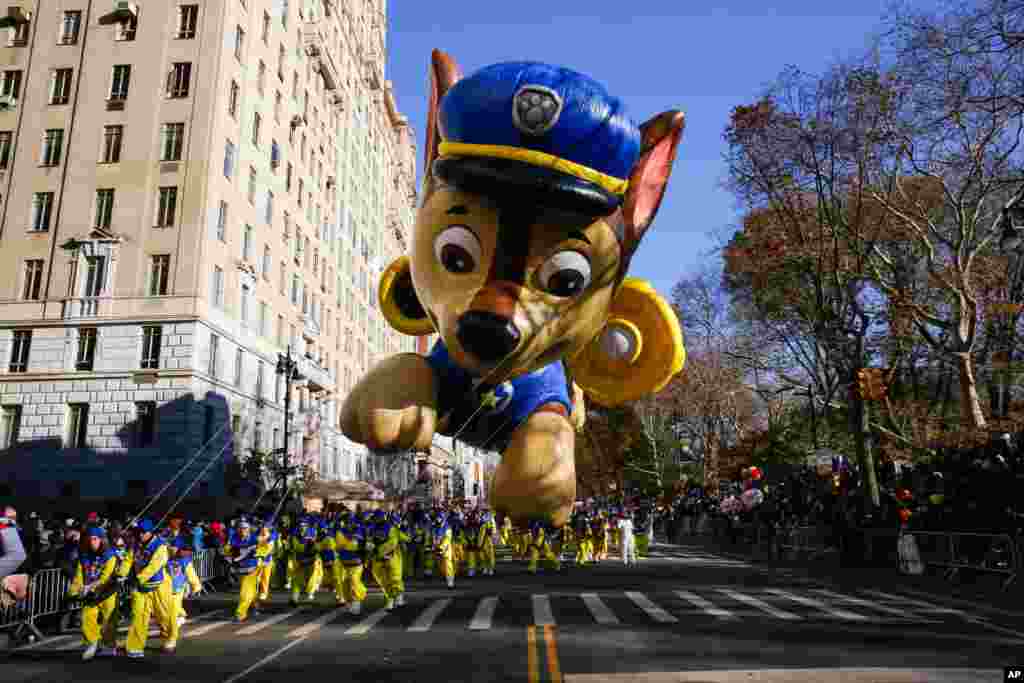 A "PAW Patrol" balloon floats over Central Park West during the 92nd annual Macy's Thanksgiving Day Parade in New York, Nov. 22, 2018.