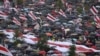 Para pedemo berlindung di bawa payung-payung
dalam demo oposisi menentang hasil pilpres, di Minsk, Belarusia, 6 September 2020. 