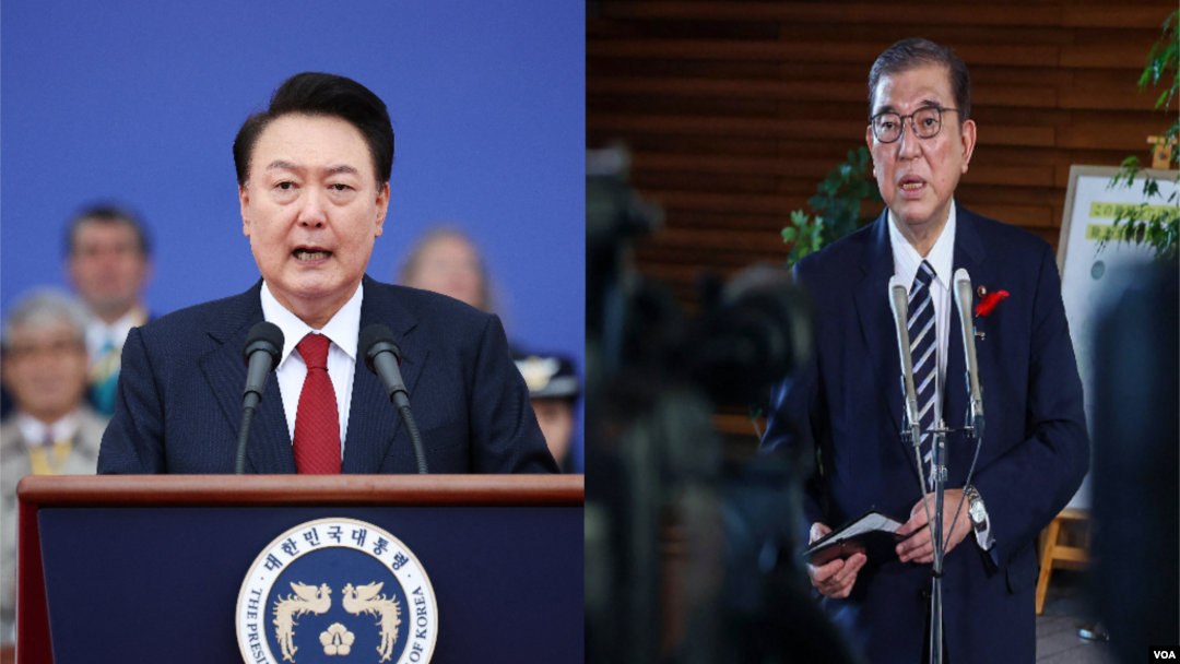 တောင်ကိုရီးယားသမ္မတ Yoon Suk Yeol (ဝဲ) နဲ့ ဂျပန်ဝန်ကြီးချုပ်သစ် Shigeru Ishiba (ယာ) 