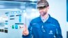 FILE - In this image released Sept. 15, 2016, German elevator maker Thyssenkrupp uses Microsoft HoloLens technology in its elevator service operations.
