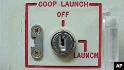 FILE - Launch key mechanism at the deactivated Delta Nine Launch Facility near Wall, South Dakota.