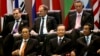 Russia's Prime Minister Dmitry Medvedev, top left, Poland's Prime Minister Donald Tusk, top center, Singapore's Prime Minister Lee Hsien Loong, top right, Laos' President Choummaly Sayasone, bottom left, China's Premier Wen Jiabao, bottom center, and Cambodia's Prime Minister Hun Sen take part in the opening ceremony for the ASEM Summit in Vientiane, Laos, Monday, Nov. 5, 2012. (AP Photo/Sakchai Lalit)