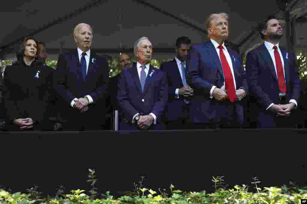 Vice President Kamala Harris, President Joe Biden, former New York City mayor Michael Bloomberg, Republican presidential candidate Donald Trump and Republican vice presidential candidate JD Vance attend a 9/11 memorial ceremony in New York, Sept. 11, 2024. 