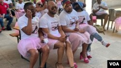 Amadoda agqoke oqwa aqhuba umkhankaso wokulimukisa abaeilisa ngengozi yemvukuzane yamabele