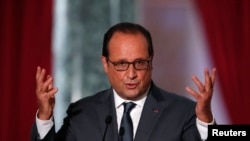 French President Francois Hollande attends his news conference at the Elysee Palace in Paris, France, Sept. 7, 2015. 