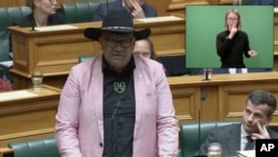 In this image from video, Indigenous New Zealand lawmaker Rawiri Waititi speaks in Parliament in Wellington, New Zealand, May 12, 2021.