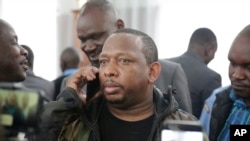 Nairobi governor Mike Gideon Mbuvi appears with other suspects accused of corruption, at the Mililani law court in Nairobi, Kenya, Dec. 9, 2019. 